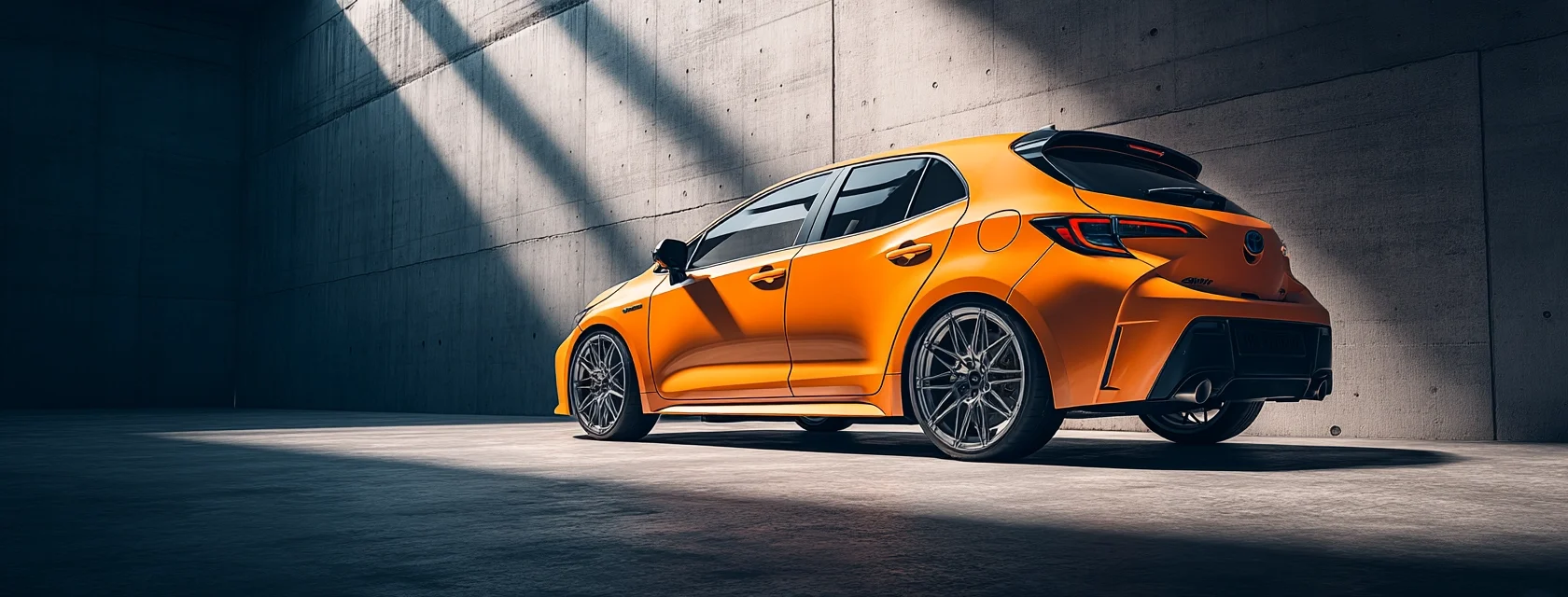Orange hot hatchback sports car rear